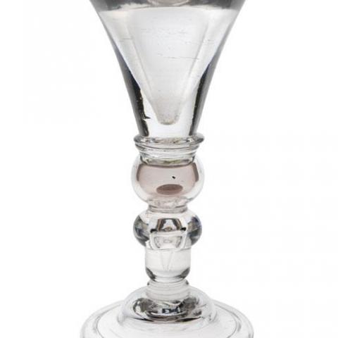 ‘Toastmaster's glass containing a small silver coin’, Burrell Collection: English Table Glass [including Waterford], © CSG CIC Glasgow Museums Collection, circa 1725.